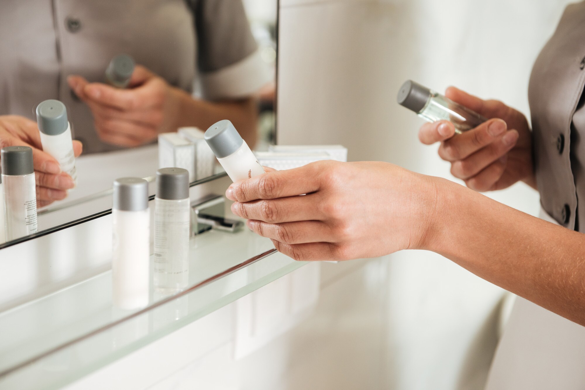young hotel maid putting bath accessories bathroom 171337 12731