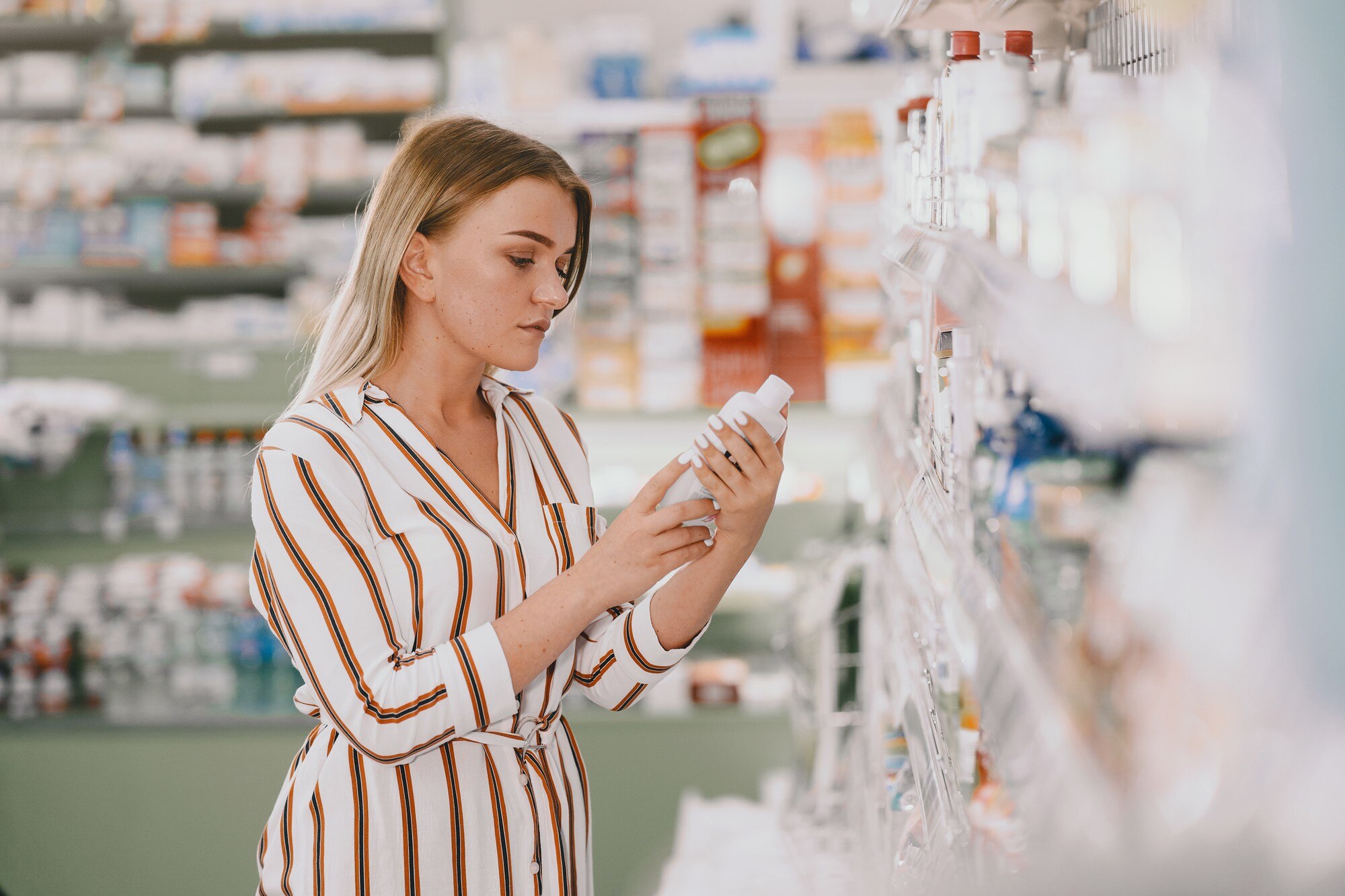 medicine pharmaceutics health care people concept female taking medications from shelf buyer 1157 42176