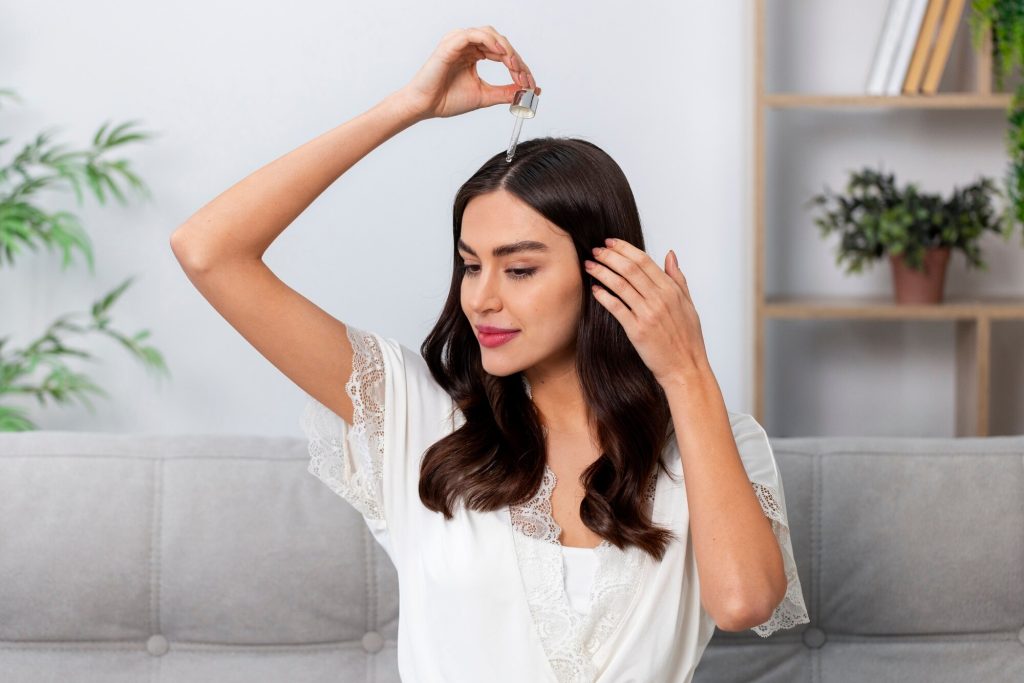 Woman massaging her scalp